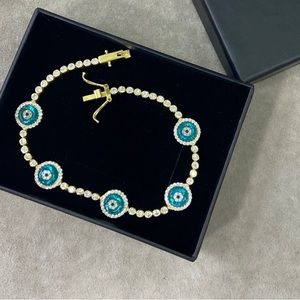 Bezel Evil eye tennis bracelet/ gold plated 925 silver. 7 inch